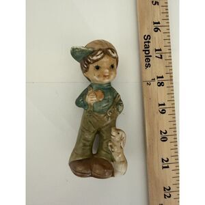 Vintage porcelain figure of boy with dog